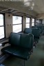 PV 020.186-3, sedadlá sú usporiadané 2+2, nad sedadlami sú pozdĺžne police pre batožinu